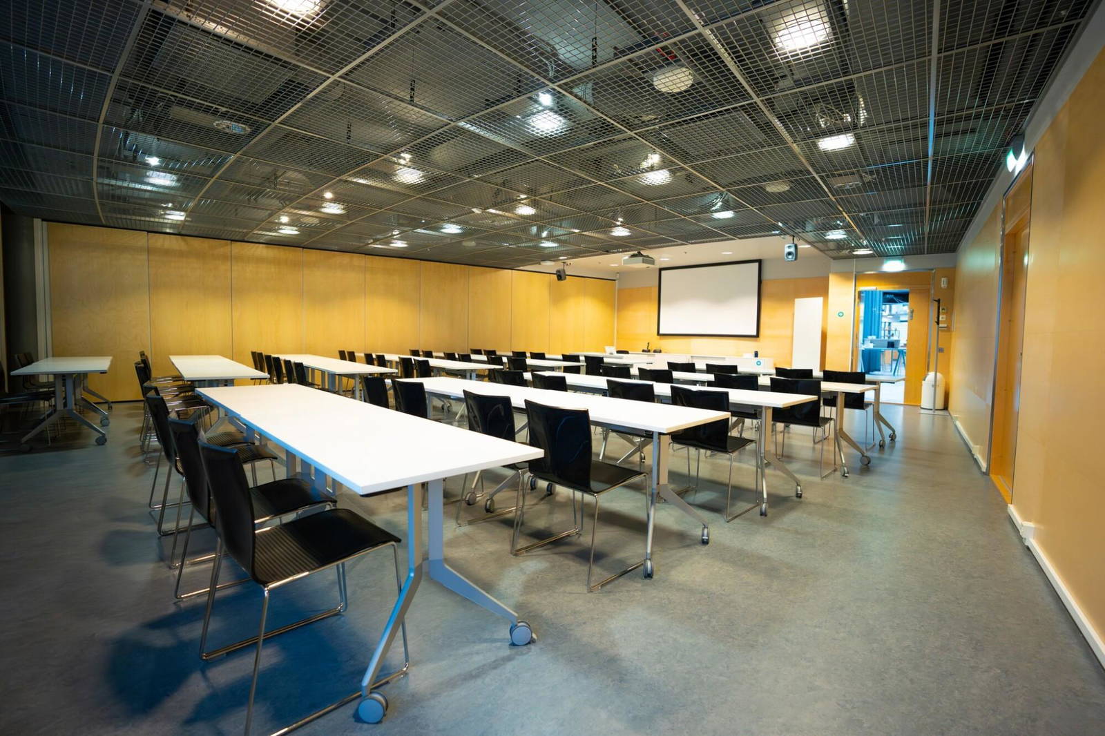 Seminar room located next to Aalto University along the Kehä I ring road, offering excellent traffic connections to all directions. It is possible to arrange the tables to a classroom (for 60 persons), diplomat or U-table (for 30 persons) mode or to set chair rows without tables (for 120 persons).