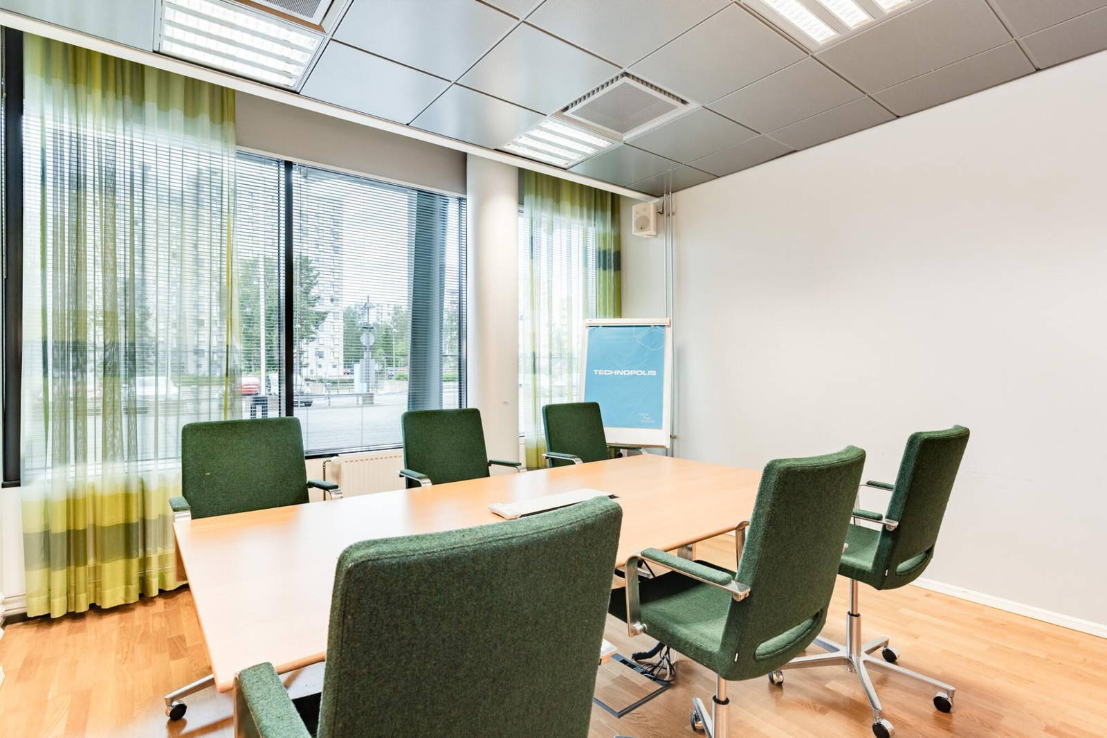 Meeting room for 6 persons at Hermia 15 building on the 1st floor. The room includes high speed Wi-Fi, a data projector, a flip chart and materials for taking notes.