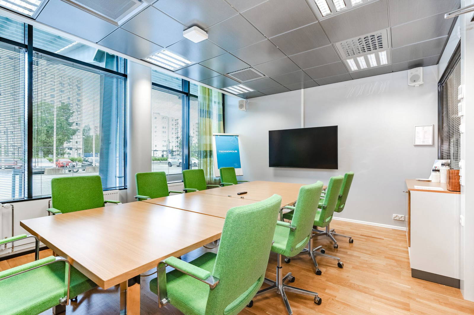 Meeting room for 10 persons at Hermia 15 building on the 1st floor. The room includes high speed Wi-Fi, AV screen, a flip chart and materials for taking notes.